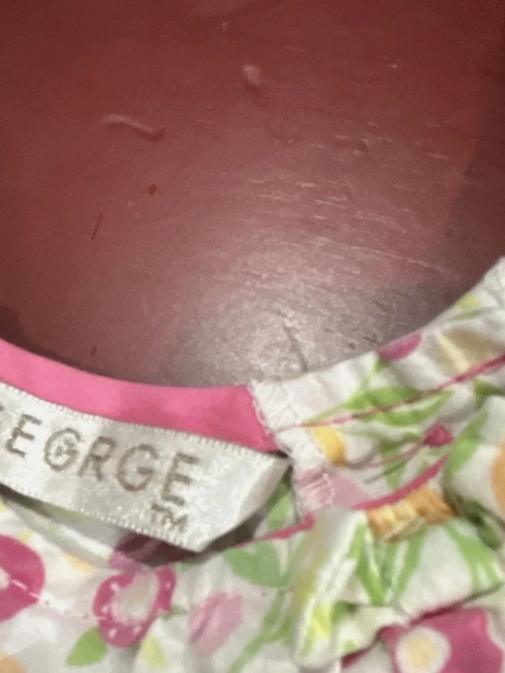 George Floral Bib in Pink, Orange, Green and White with Felt Flower